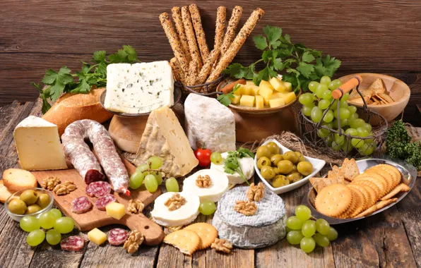 Picture cheese, bread, grapes, nuts, crackers