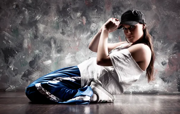 Picture girl, pose, background, wall, flexibility, dance, t-shirt, cap, brown hair, on the floor, sneakers, pants