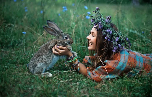 Picture grass, girl, joy, nature, smile, animal, rabbit, brunette, bracelets, baubles