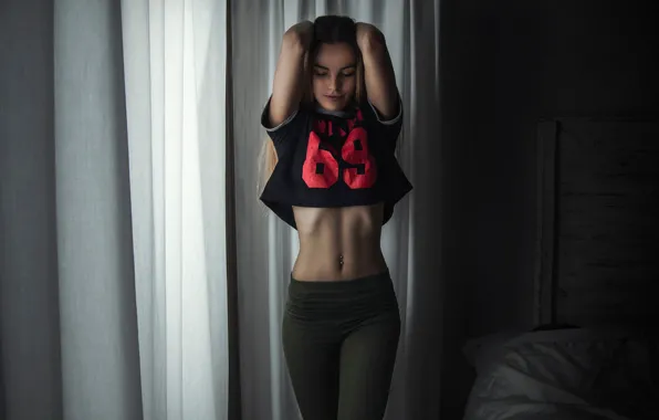 Picture girl, sexy, pose, bed, tummy, makeup, figure, slim, piercing, window, t-shirt, hairstyle, curtains, pants