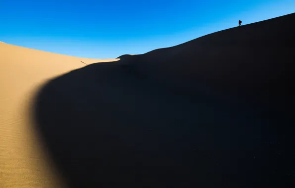 Picture the sky, people, dunes