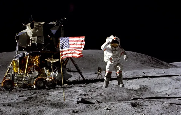 Picture the moon, flag, astronaut