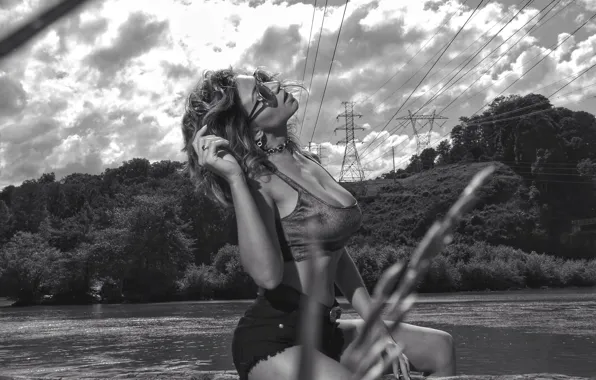 Picture the sky, girl, clouds, trees, landscape, nature, pose, river, shore, wire, shorts, figure, glasses, hairstyle, …