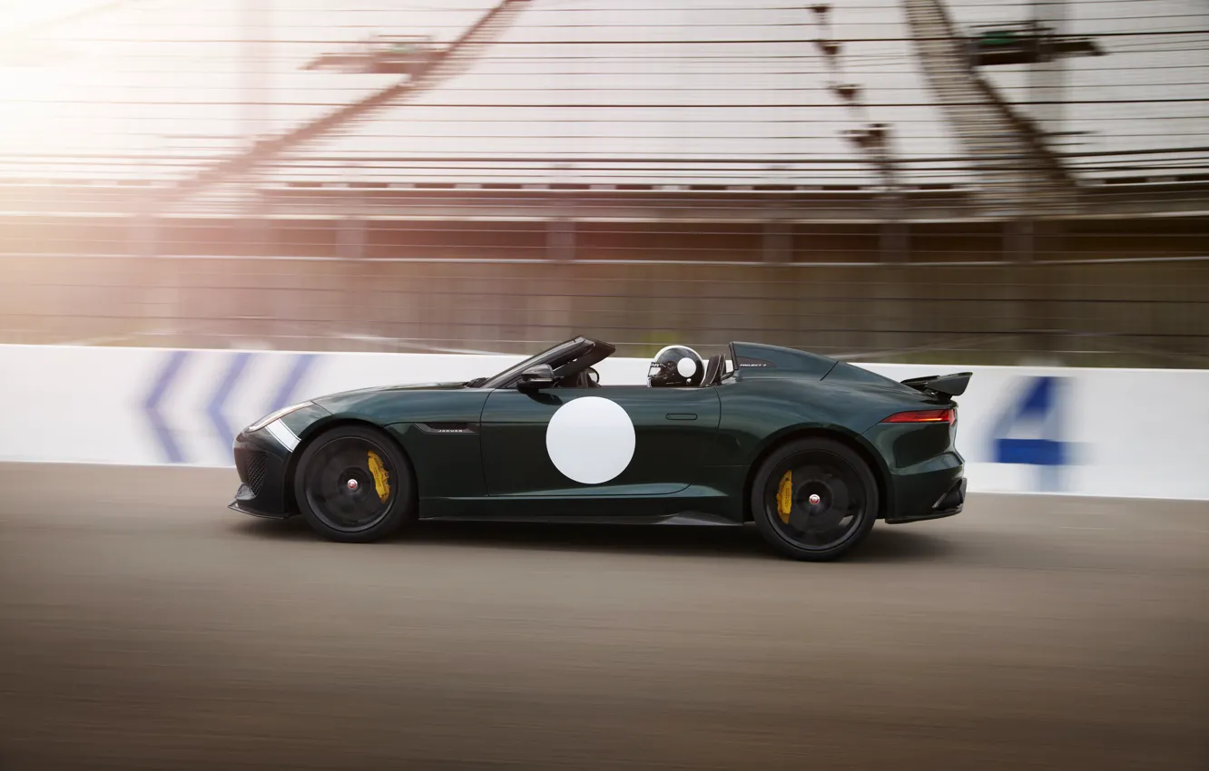 Photo wallpaper asphalt, movement, speed, track, Jaguar, blur, the fence, tribune, dark green, V8, 575 HP, 5.0 …
